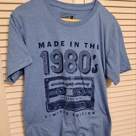 Blue Graphic T-Shirt with 1980s Design - Picture 1 of 3